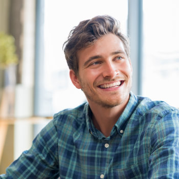 Closeup of cheerful young man 1