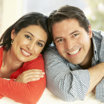 Hispanic Couple Relaxing At Home 1